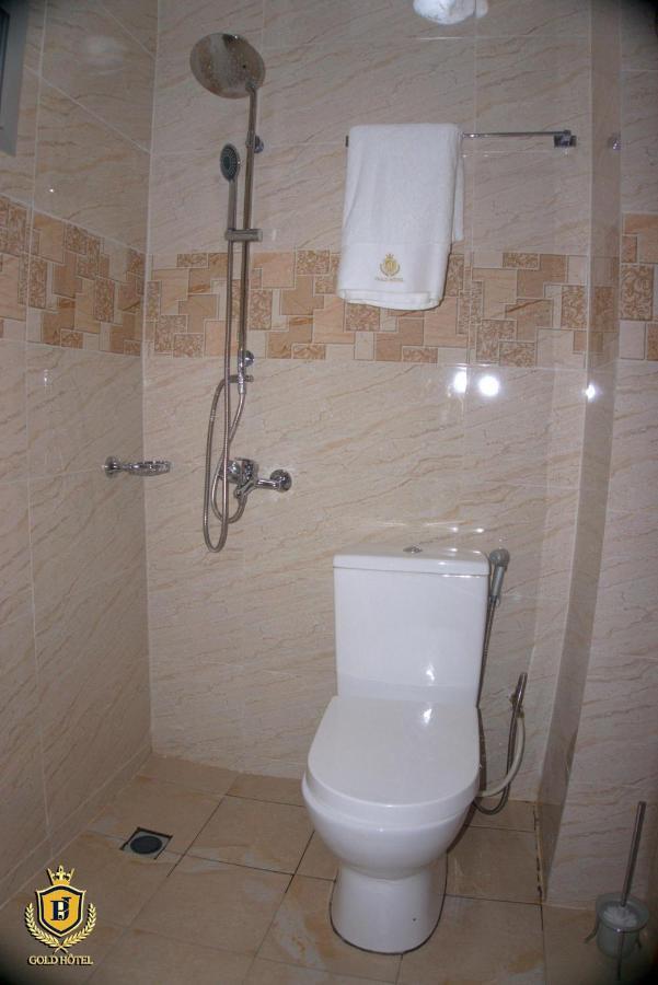 Gold Hotel Bafang Bagian luar foto