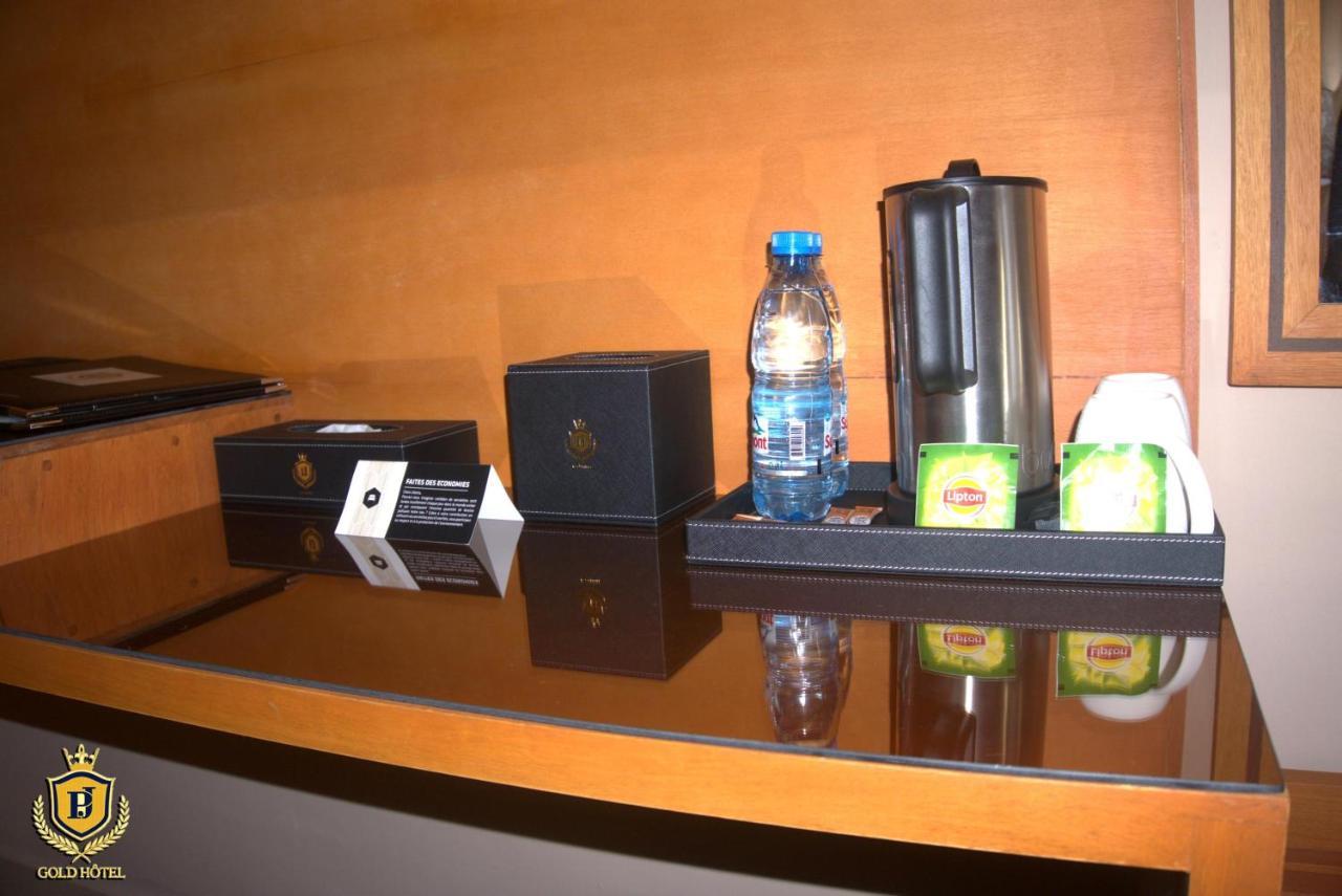 Gold Hotel Bafang Bagian luar foto
