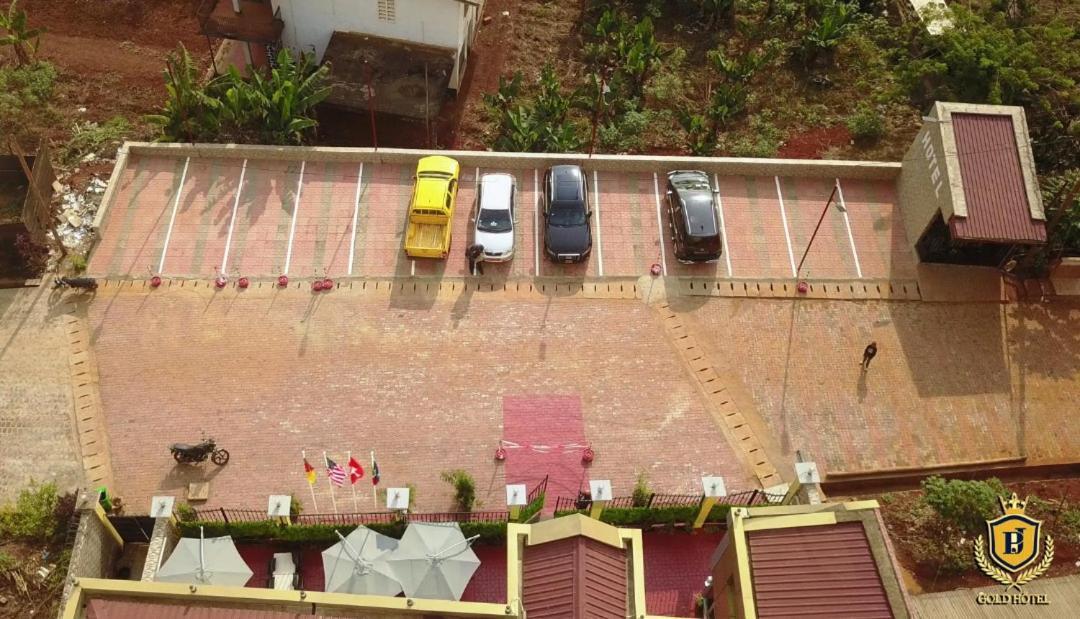Gold Hotel Bafang Bagian luar foto