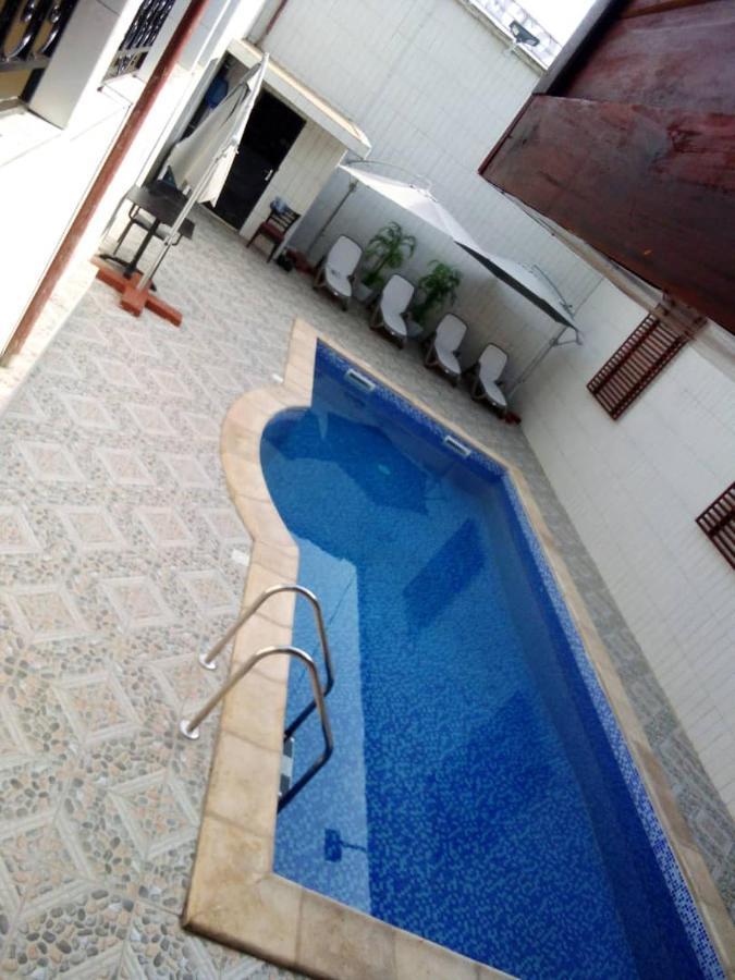 Gold Hotel Bafang Bagian luar foto
