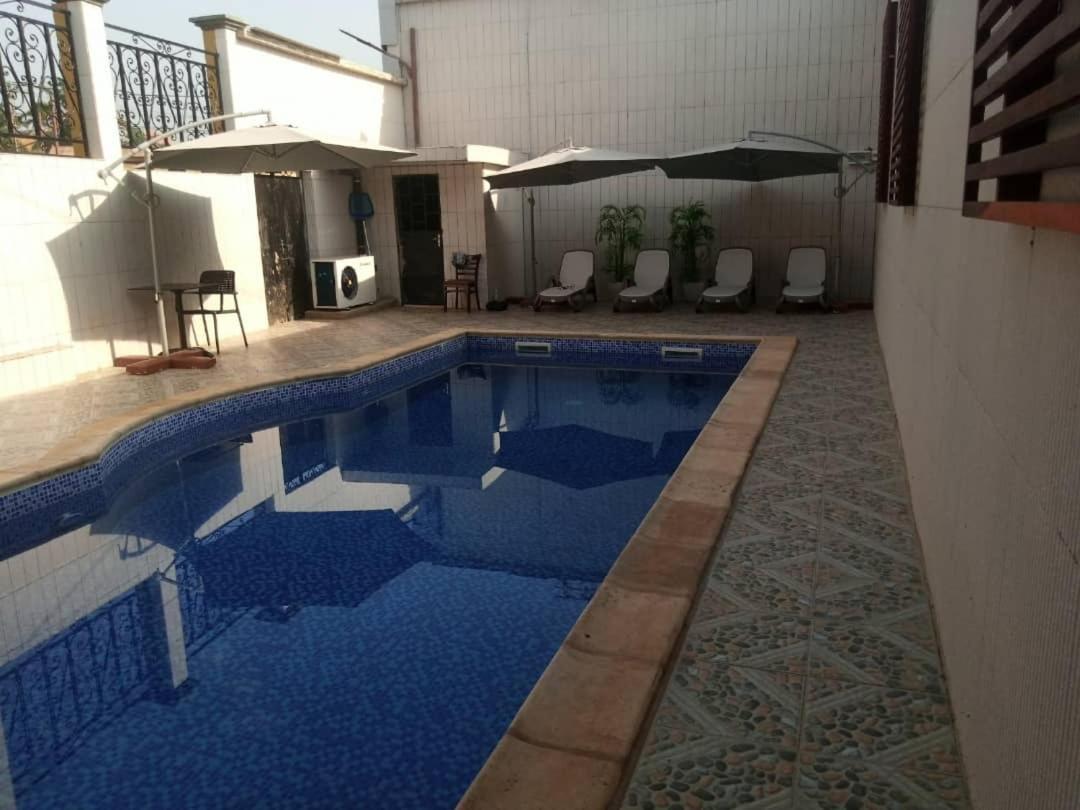 Gold Hotel Bafang Bagian luar foto