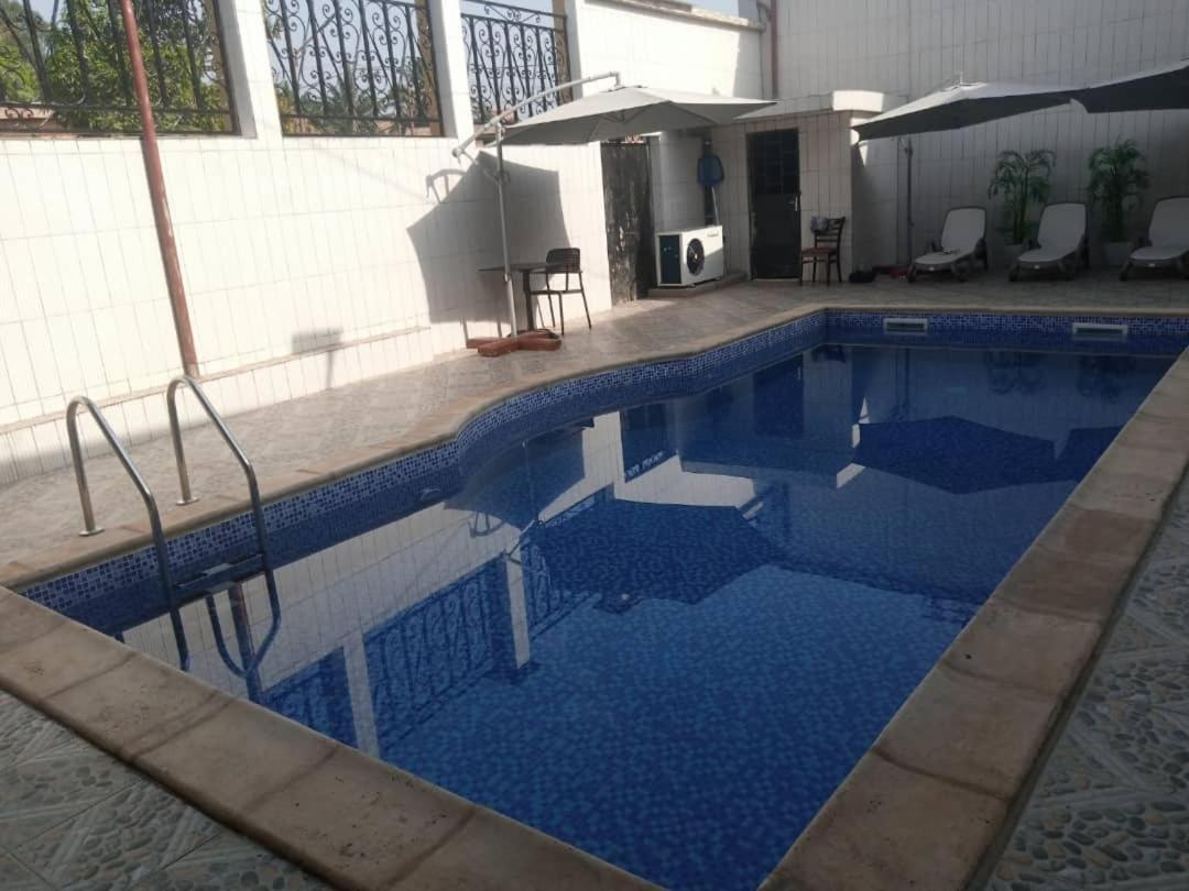 Gold Hotel Bafang Bagian luar foto